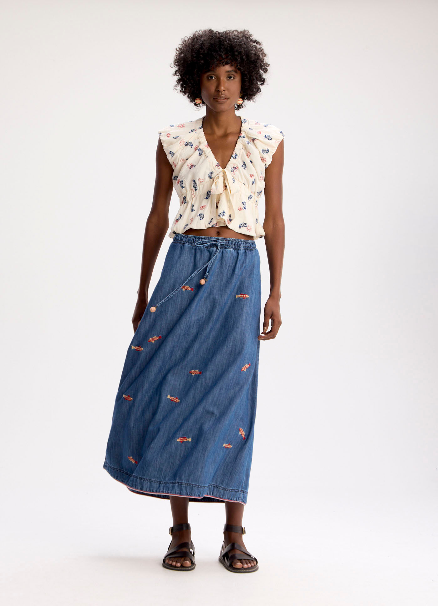 Saia jeans bordado cardume jeans